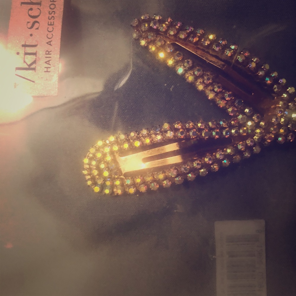 Kitsch rhinestone hair clips. Yellow gold tone.